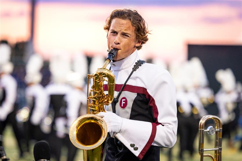 Students perform on football field